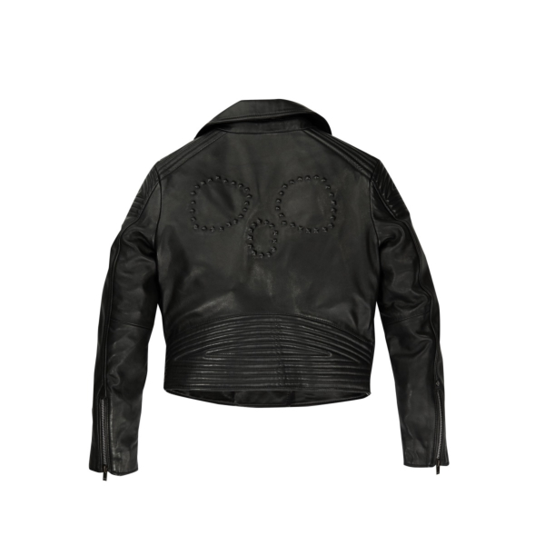 The back of Saint Ape's Glamorous Ape 01 Studs Edition black leather jacket hangs in front of a white background 